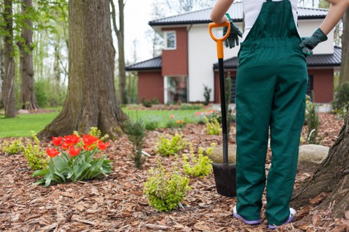 Professional garden maintenance booking and service confirmation scene
